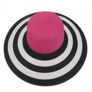 woman wide brim beach hat straw